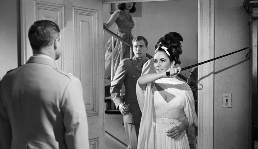 Marlon Brando (back) and Elizabeth Taylor in Reflections in a Golden Eye (dir. John Huston, 1967). (Warner Bros./Photofest)