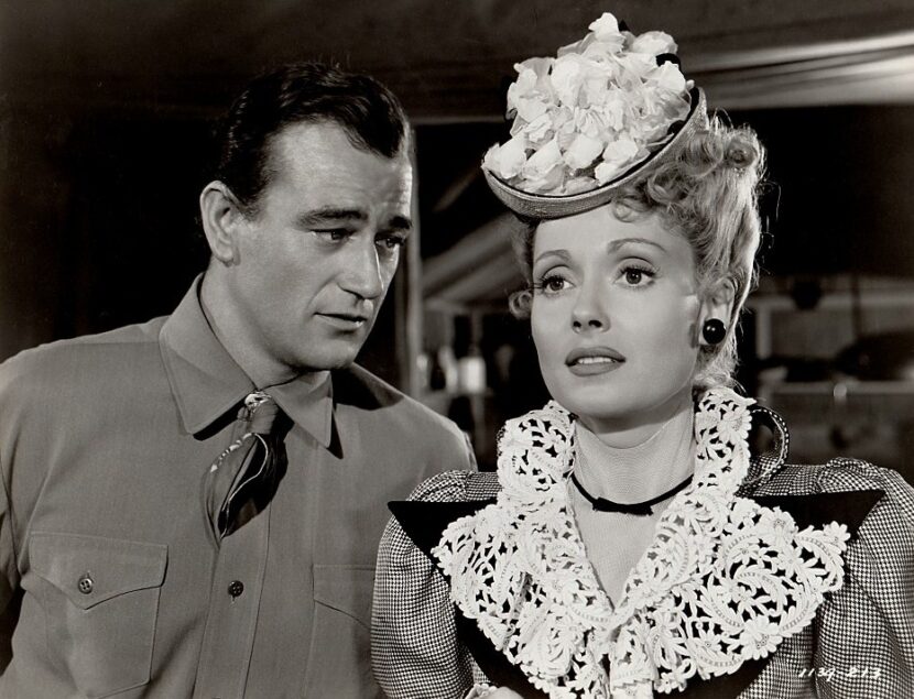 Still of John Wayne and Martha Scott in War of the Wildcats